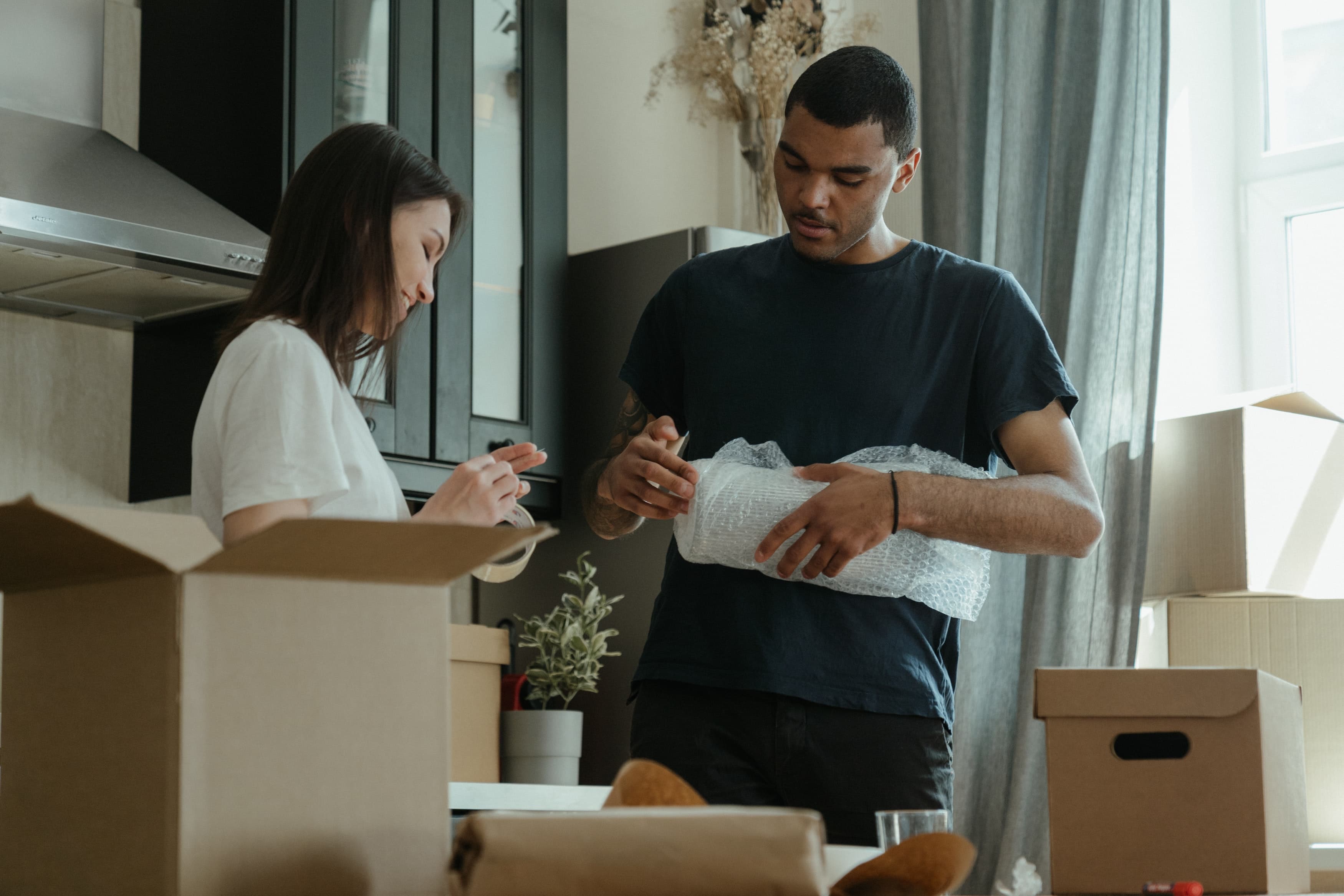 Couple moving out of their home. Photo by Cottonbro Studio