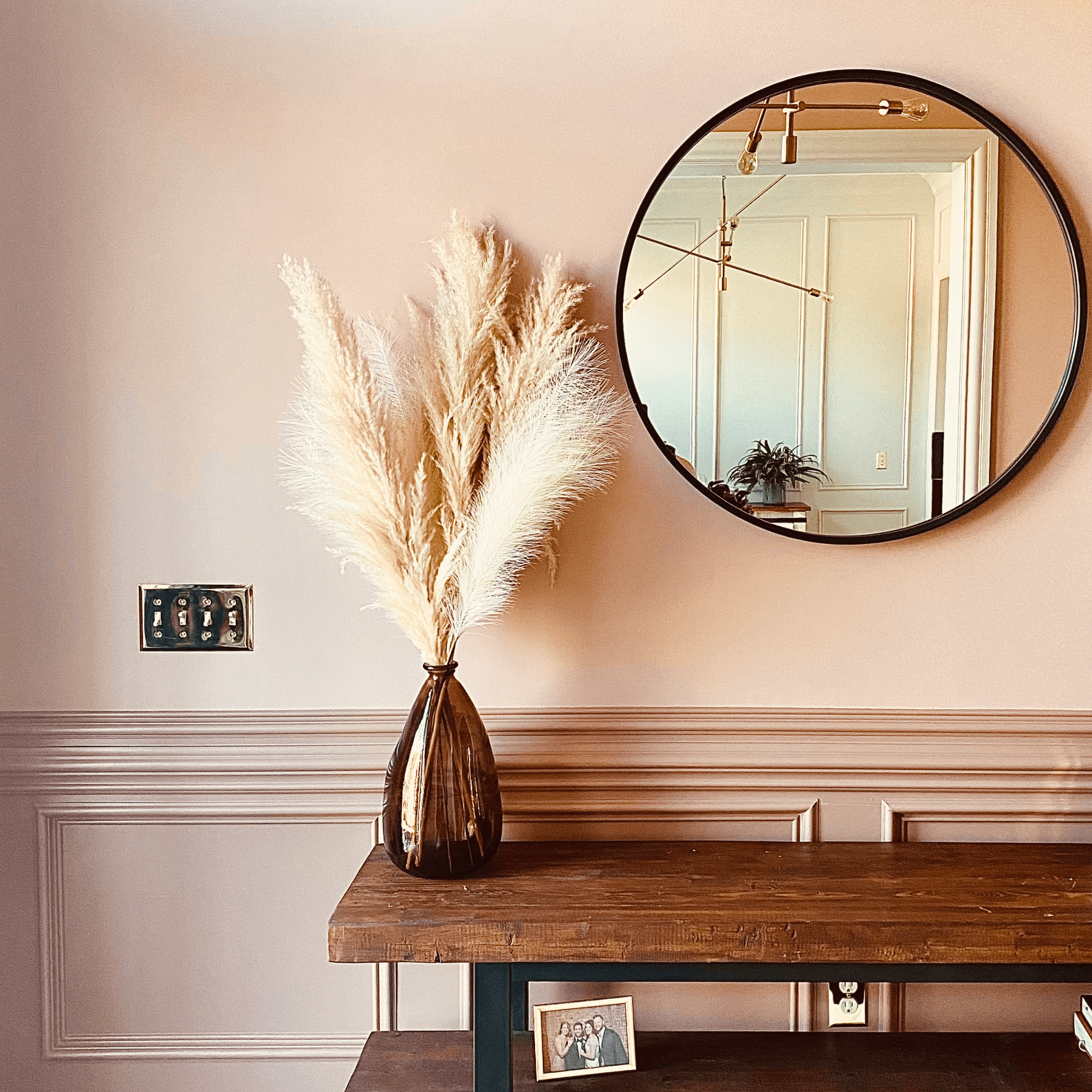 Craftwork painted an entryway in Sherwin-Williams Pinky Beige and Sherwin-Williams Redend Point.