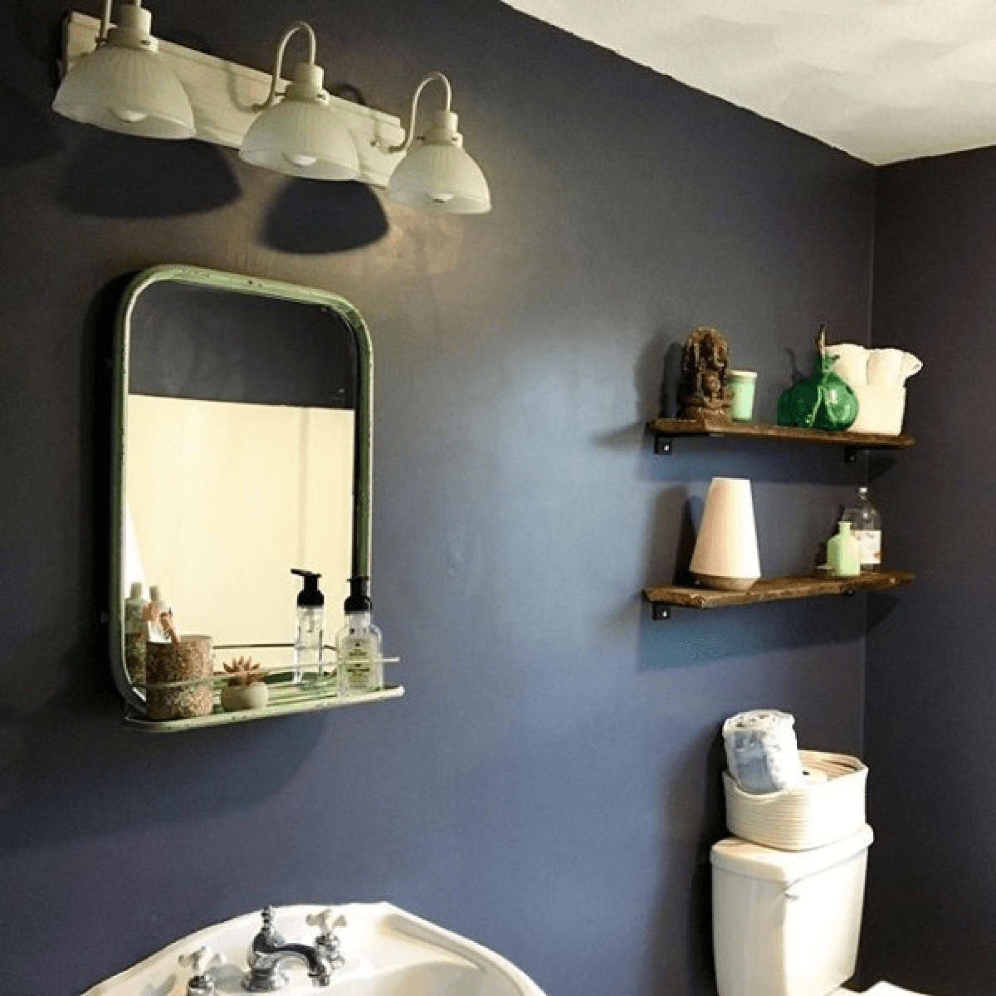 @mandakate82 used Sherwin-Williams Mineral Gray (SW 2740) to paint their bathroom.